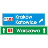 E-2d Drogowskaz tablicowy umieszczany nad jezdnią na autostradzie. Wskazuje na skrzyżowaniu lub bezpośrednio przed nim kierunki do miejscowości lub dzielnic miast