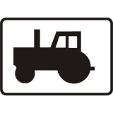 Tabliczka T-23c Dotyczy ciągników rolniczych i pojazdów wolnobieżnych. Tabliczka wskazująca, że znak dotyczy ciągników rolniczych i pojazdów wolnobieżnych