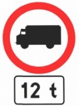 B-5 Zakaz wjazdu samochodów ciężarowych. Określona na znaku B-5 albo na tabliczce umieszczonej pod nim masa oznacza, że zakaz dotyczy pojazdu (zespołu pojazdów), którego dopuszczalna masa całkowita przekracza masę podaną na znaku albo na tabliczce